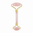 Pink jade facial roller with gold accents, viewed from above on a white background.