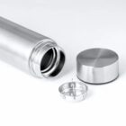 A stainless steel bottle with its lid and filter removed, displayed on a white background.