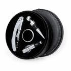 Round black case with wine accessories: corkscrew, stopper, pourer, and drip ring.