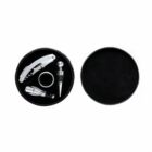 Round black box with wine tools: corkscrew, stopper, pourer, and drip ring, lid beside it.