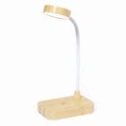 Modern desk lamp with a bamboo base, flexible white neck, and circular light head.