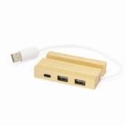 A wooden USB hub with a white cable, featuring three ports: USB-C and two USB-A.