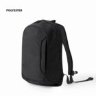 Black polyester backpack with padded straps, photographed against a plain white background.