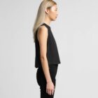 Person with long blonde hair wearing a sleeveless black top, shown in side profile.
