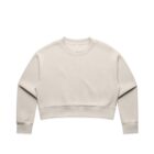Beige long-sleeve crew-neck cropped sweatshirt laid flat on a white background.