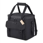Black insulated cooler bag with top handle, shoulder strap, and front pocket with buckles.