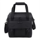 Black insulated cooler bag with top handles, front pocket, and an adjustable shoulder strap.