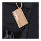 A cardboard tag on a black bag reads, ONCE UPON A TIME, I WAS A BOTTLE.