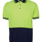 Two-tone short sleeve polo shirt in neon yellow and navy blue with a chest pocket.