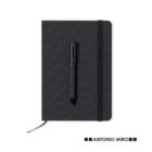 A black notebook with a pen placed on top and ANTONIO MIRO logo at the bottom right.