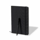 Black notebook with elastic band and a black pen attached to the front cover.