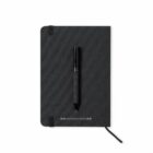 Black notebook with a pen attached on top, and Antonio Miro printed at the bottom center.