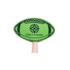 A hand holding a green foam sign shaped like an American football, with GREEN GARDEN printed in the center along with a stylized leaf logo.