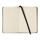 Open lined notebook with a black ribbon bookmark, lying flat.