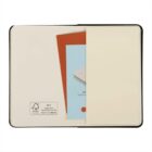 Open notebook with a pocket on the inside back cover holding two pieces of colored paper, one red and one blue. The notebook is plain with an FSC certification logo and number on the left page.