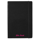 Black notebook with a textured cover and an elastic band closure on the right. The name Ellie Smith is printed in pink at the bottom center of the cover.