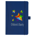A blue notebook featuring a colorful star design in various sizes on the cover. The text Childrens Charity is printed below the stars. The notebook has an elastic band for closure and a pen loop on the side.