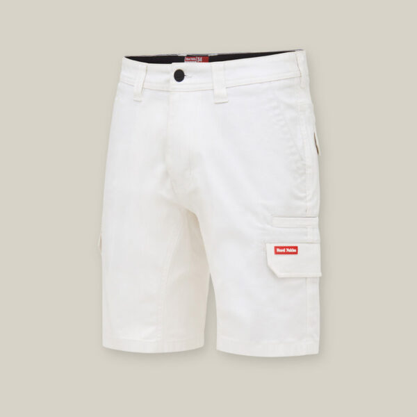 White cargo shorts on a light gray background, with multiple pockets ideal for essentials like the Emz A5 Notebook, featuring a small red and white label on one pocket.