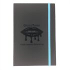 Black notebook with a blue elastic band. The cover features a dripping lip design and the words GlossTone and High-Impact Branding in black text.