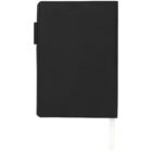 A closed black notebook with a white ribbon bookmark.