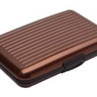 Brown, ridged, rectangular hard case with a black latch, shown closed on a white background.