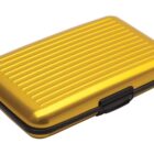 A yellow, ridged, rectangular hard case with a black clasp.