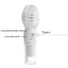 Portable white handheld fan with a water reservoir base and a Type-C charging port. Text indicates functions: atomizer switch and on/off operated by pressing buttons.