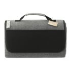 Gray and black felt picnic tote bag with a handle and a tag attached.