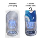 Two no-show socks in packaging are shown. The left has a clear plastic package labeled Standard packaging, while the right is in a plastic package with a colorful header card labeled Custom header card. Both socks are gray with blue grips.