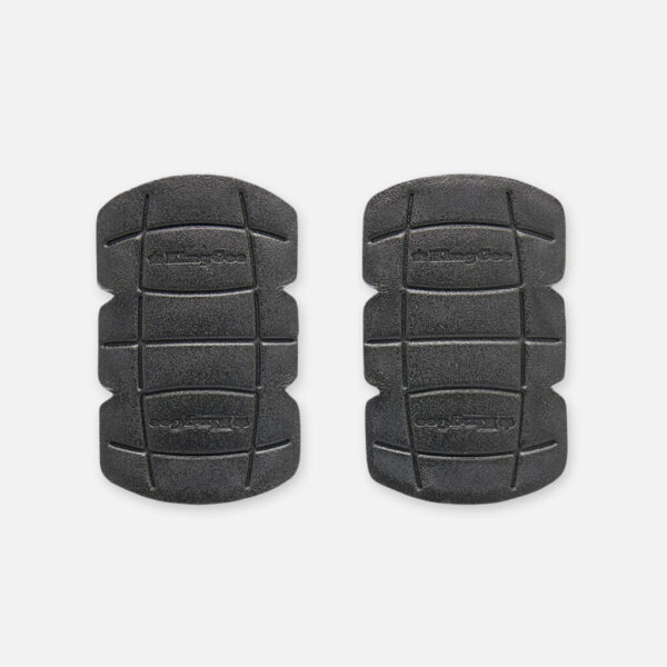 A pair of Explorer Shield knee pads, black with curved edges and grooved lines.