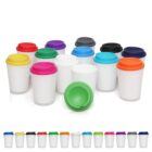 Twelve white reusable cups with colorful lids arranged in rows, one cup lying on its side.