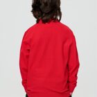 Person with medium-length brown hair wearing a red shirt, facing away from the camera.