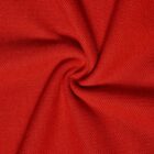 Close-up of red fabric twisted into a swirl, showing texture and weave details.