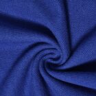 Close-up of blue textured fabric with a swirl pattern in the center.