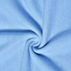 Light blue textured fabric twisted into a swirl, showing its knit pattern.