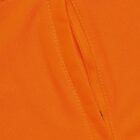 Close-up of an orange fabric with a diagonal stitched pocket opening.