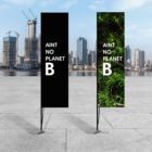 Two banners read AINT NO PLANET B with city buildings in the background.