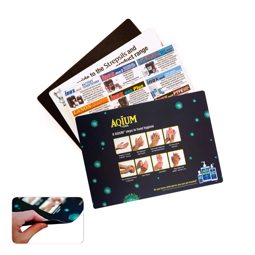 A set of informative mouse pads with unique content, including hand hygiene steps and product details, featuring an inset image of a hand lifting a pads edge. Also available as the Sale II Counter Mat (420mm x 594mm x 1mm).