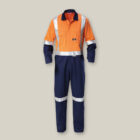 Explorer Shield hi-vis coverall in orange/navy with reflective safety stripes.