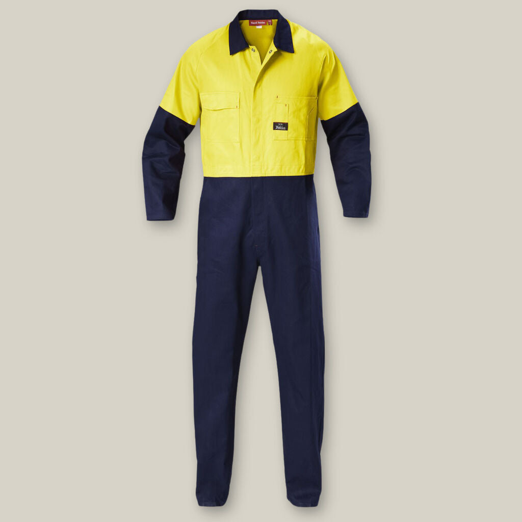 Explorer Shield coveralls in yellow and navy blue shown on a plain background.