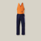 Explorer Shield overalls in orange and navy blue hanging against a beige background.