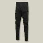 Black slim-fit Explorer Shield cargo pants with multiple pockets on a beige background.