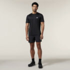 Man in black athletic wear and sneakers stands ready with his Explorer Shield.