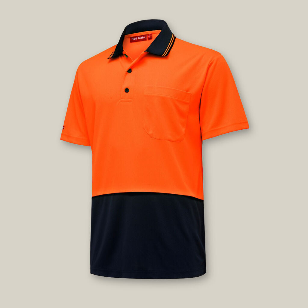 Orange and black Explorer Shield polo with pocket and black collar details.