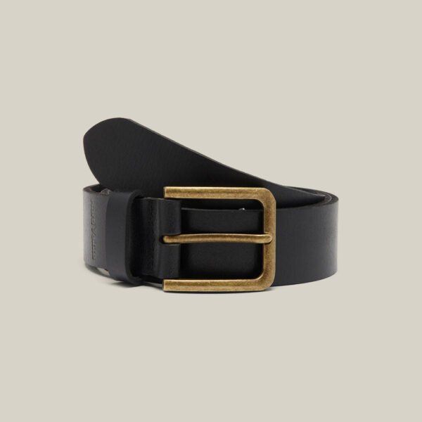 Black leather Explorer Shield belt with brass buckle on a neutral background.