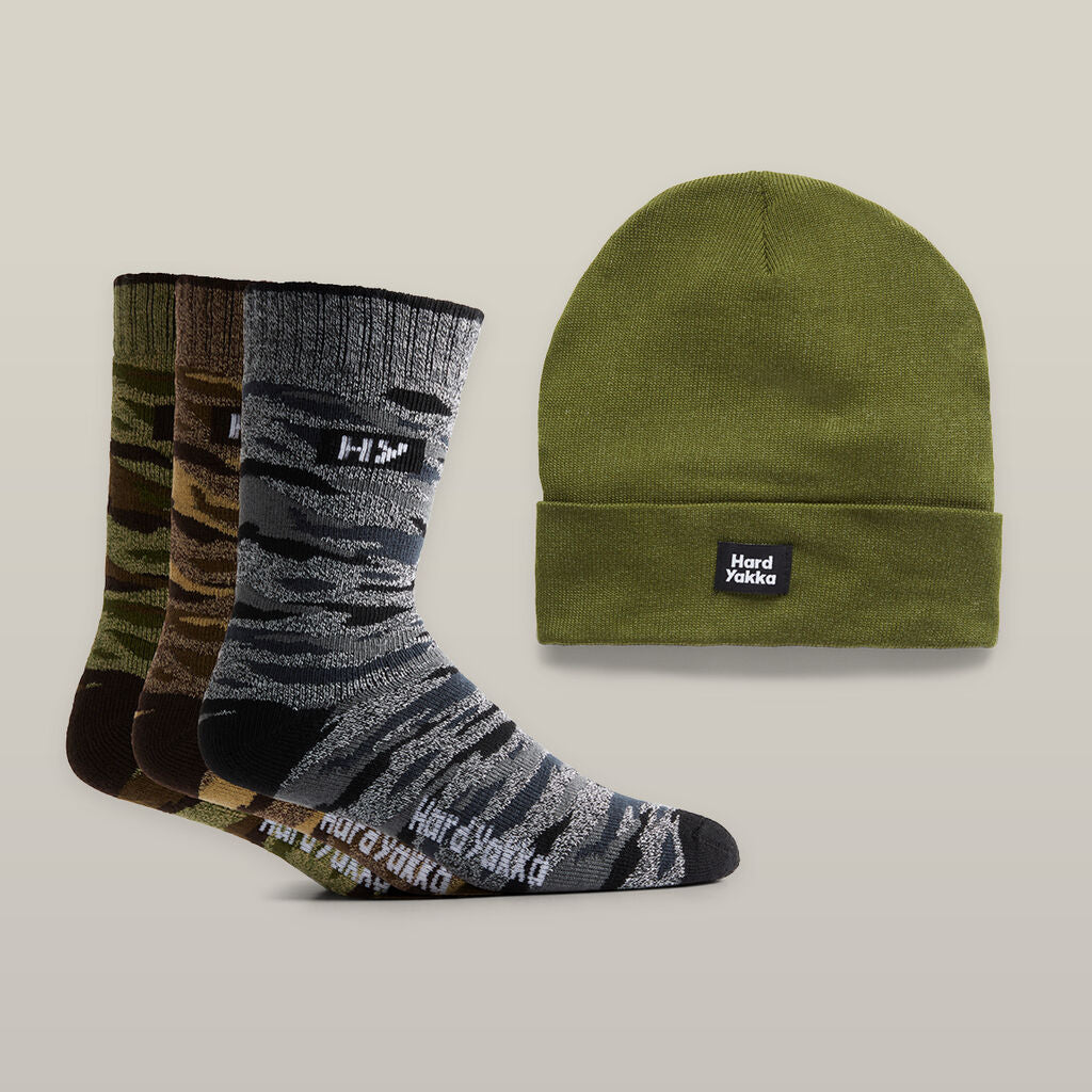 Three pairs of camouflage socks and a green Explorer Shield beanie by Hard Yakka.