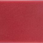 A square, textured, solid red surface with a slightly rough appearance.