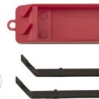 Red toy ejector with black lifters, wheels, and metallic rods.