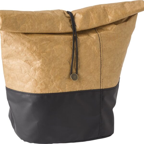 Two-tone backpack with a brown paper-like top and black base, featuring a drawstring closure.