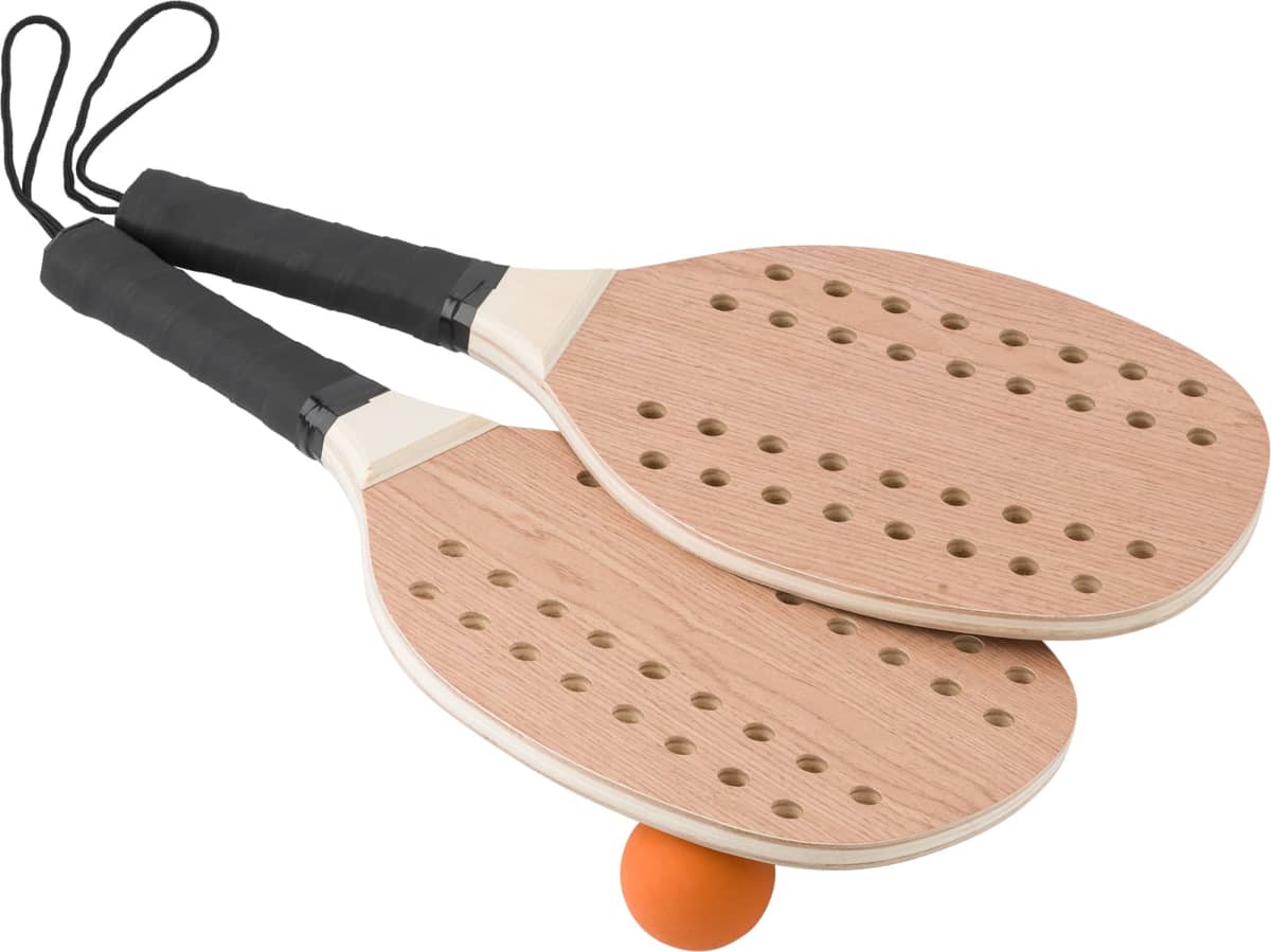 Two wooden paddles with holes and a single orange ball.